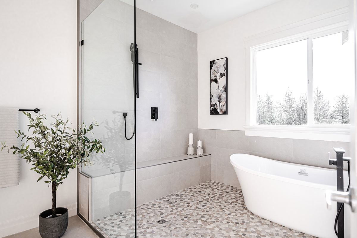 Bathroom shower renovation with pebble tiles in Whistler