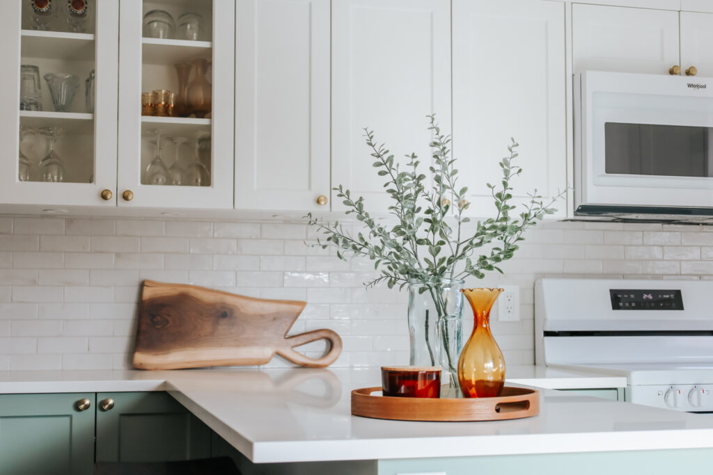 Your kitchen is one of the most important spaces in your home; a place for you to cook, entertain family, and enjoy time with friends. That's why it’s important to design a kitchen that is both stylish and functional. While planning your dream kitchen, carefully consider cabinet styles, hardware, sinks, paint colours, and backsplash tiles. Team Livwell Collective is happy to bring you the latest trends and themes in kitchen design, featuring a mix of modern, retro, and country styles which are budget-friendly, and smart while making your kitchen stand out.